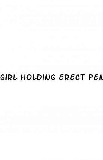 girl holding erect penis