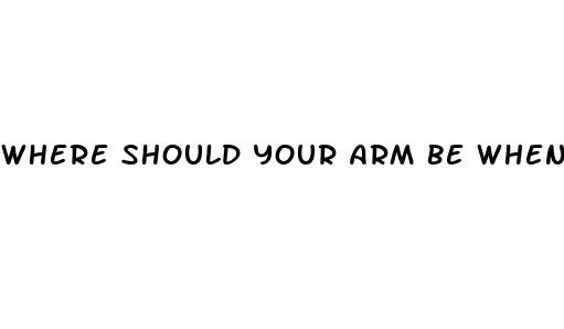 where should your arm be when taking blood pressure