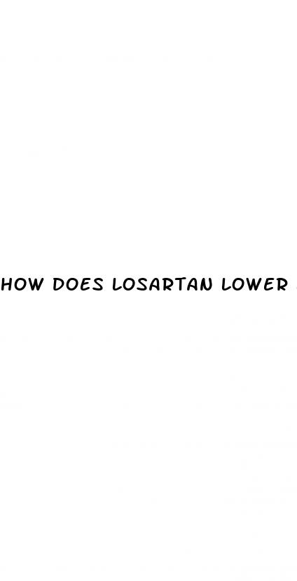 how does losartan lower blood pressure