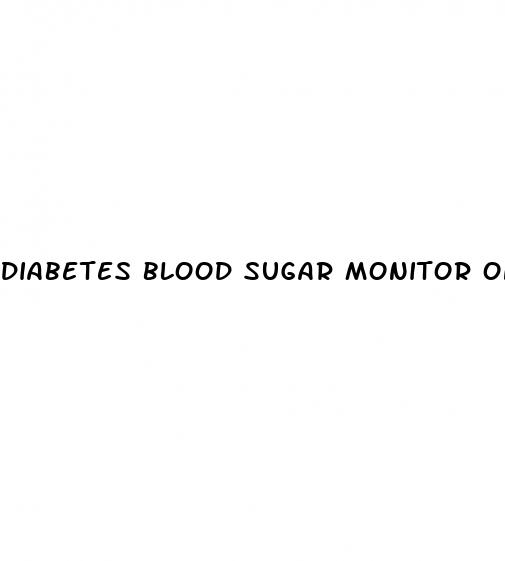 diabetes blood sugar monitor on arm